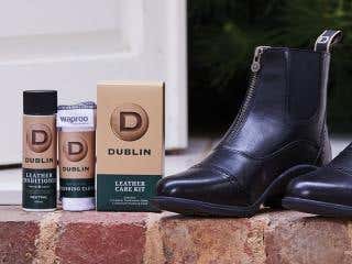 Dublin leather products and Dublin leather boots on a brick wall