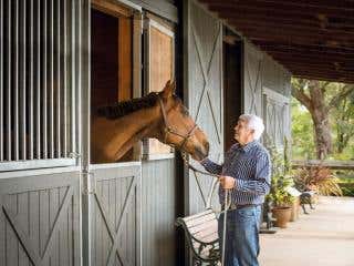 Geoff Searl (creator of Oakwood) with a horse