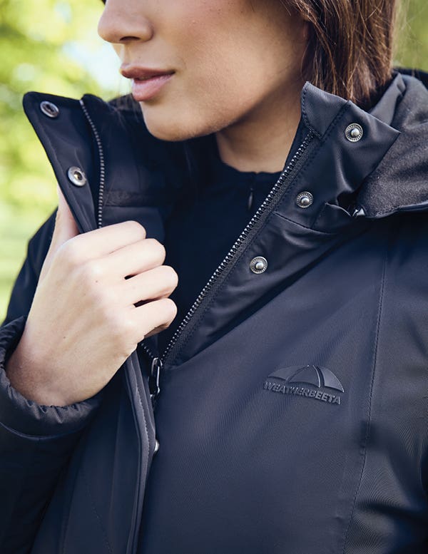 Close up of WeatherBeeta All Purpose Longline Waterproof Equestrian Jacket